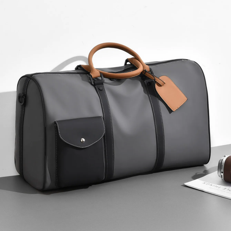 Luxury Water‑Resistant Leather Travel Duffel – Adjustable Strap & Multi‑Pocket Design