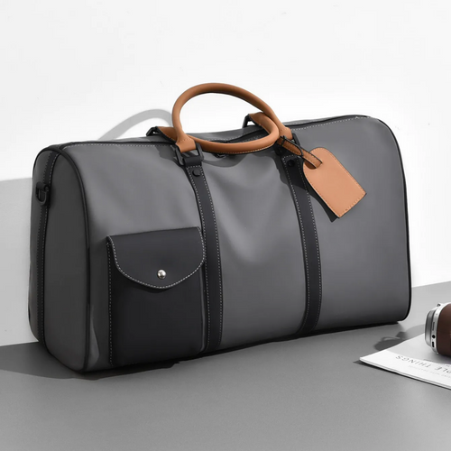 Luxury Water‑Resistant Leather Travel Duffel – Adjustable Strap & Multi‑Pocket Design